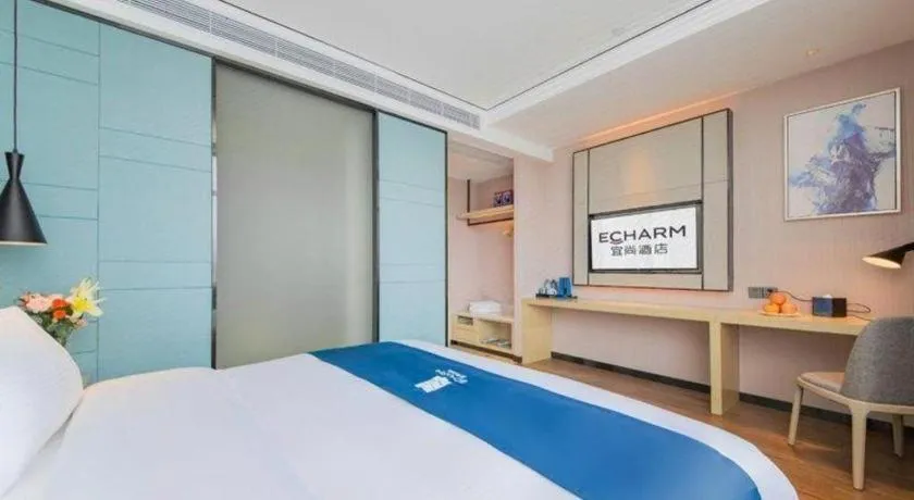 Bed in Echarm Hotel Huangshi Yingbin Avenue