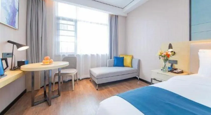 Bed in Echarm Hotel Huangshi Yingbin Avenue