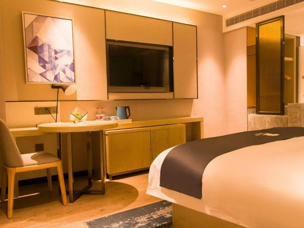 Bed in Echarm Hotel Huangshi Yingbin Avenue