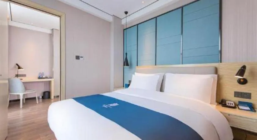 Bed in Echarm Hotel Huangshi Yingbin Avenue