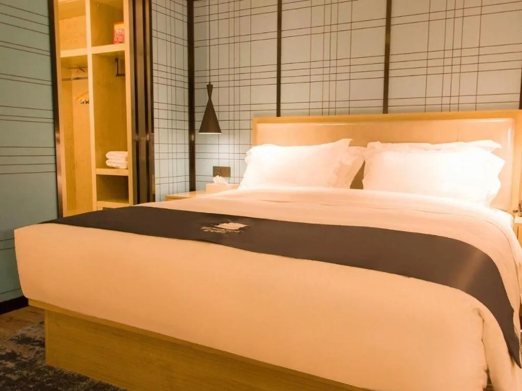 Bed in Echarm Hotel Huangshi Yingbin Avenue