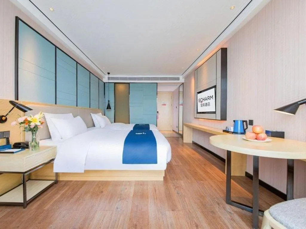 Bed in Echarm Hotel Huangshi Yingbin Avenue