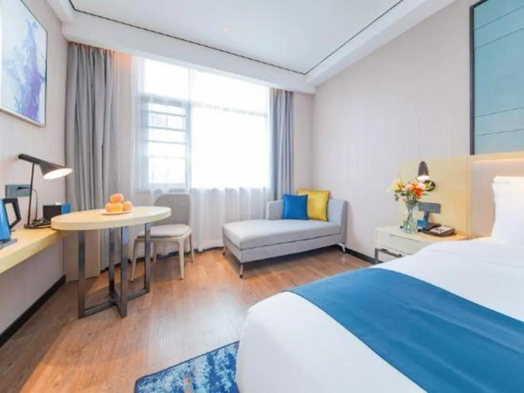 Bed in Echarm Hotel Huangshi Yingbin Avenue
