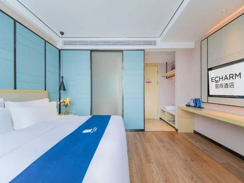 Bed in Echarm Hotel Huangshi Yingbin Avenue