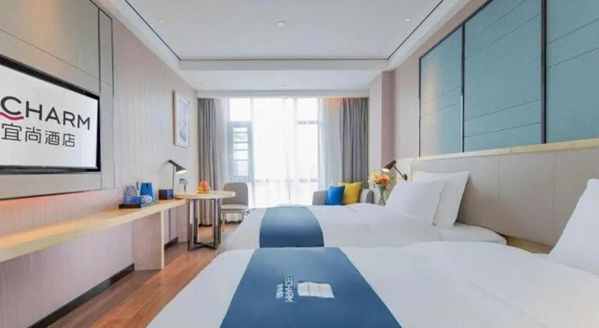 Bed in Echarm Hotel Huangshi Yingbin Avenue