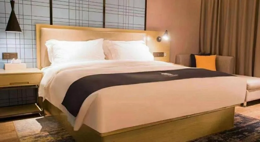 Bed in Echarm Hotel Huangshi Yingbin Avenue