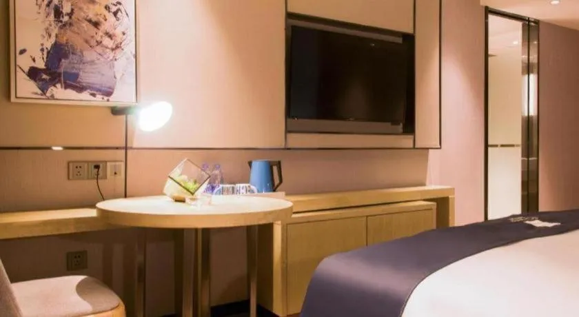 Bed in Echarm Hotel Huangshi Yingbin Avenue