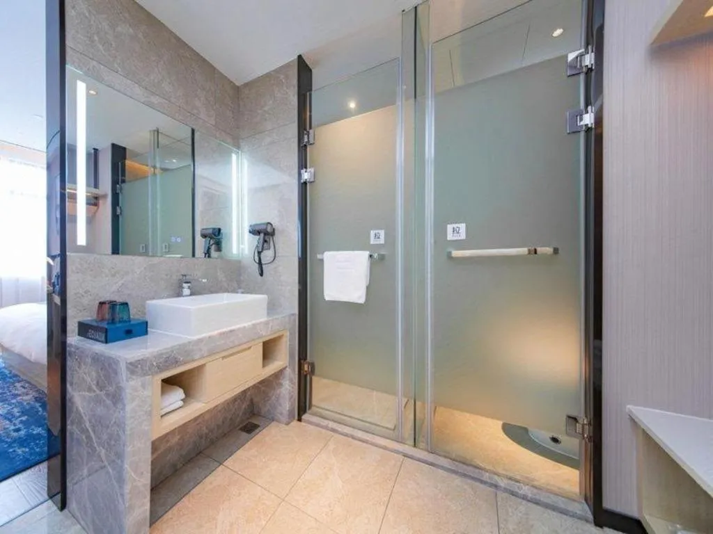 Bed in Echarm Hotel Huangshi Yingbin Avenue