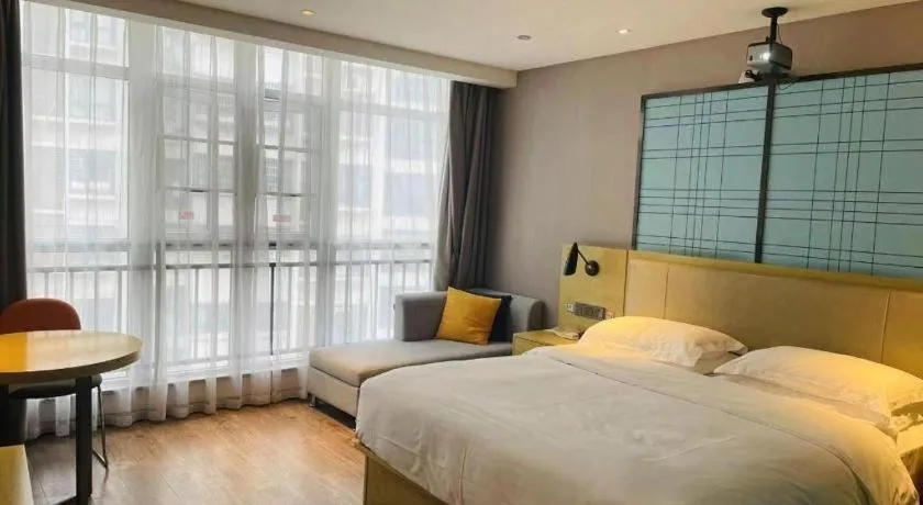 Bed in Echarm Hotel Huangshi Yingbin Avenue