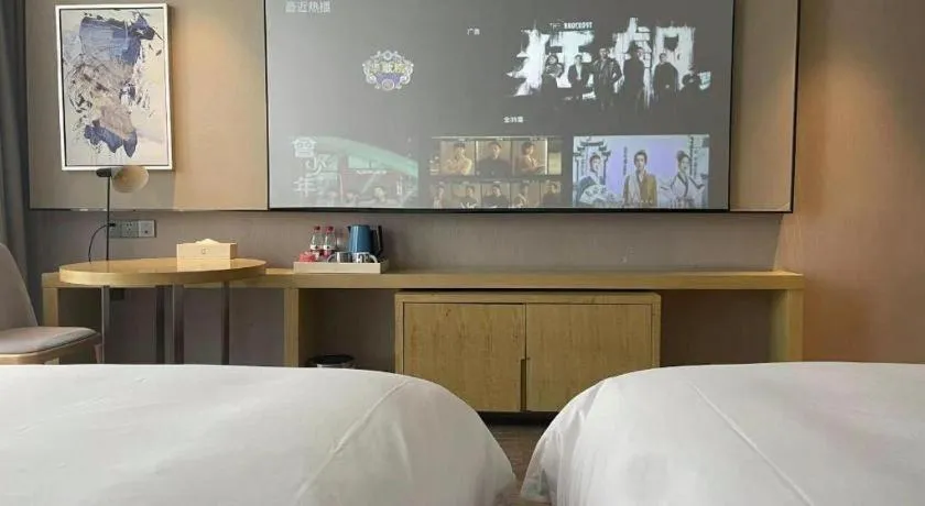 Bed in Echarm Hotel Huangshi Yingbin Avenue