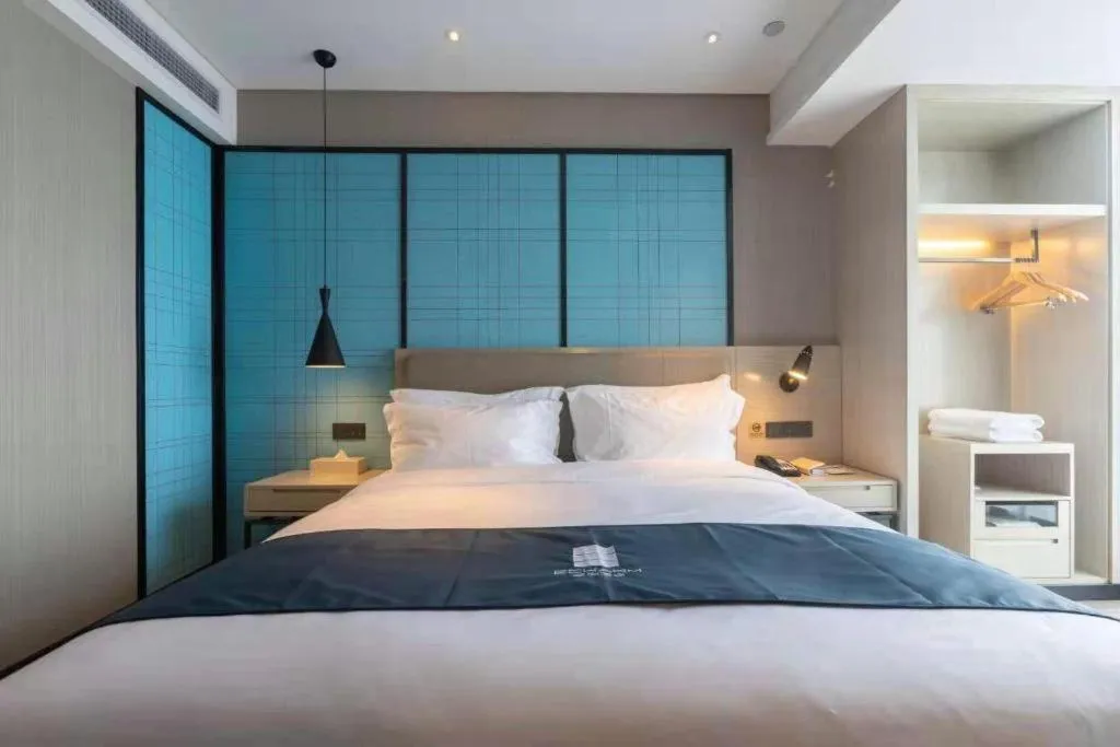 Bed in Echarm Hotel Changchun Jiutai District Government Railway Station