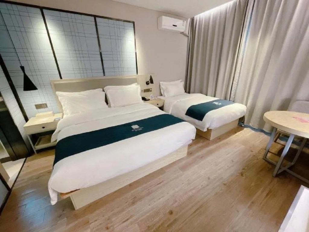 Bed in Echarm Hotel Changchun Jiutai District Government Railway Station