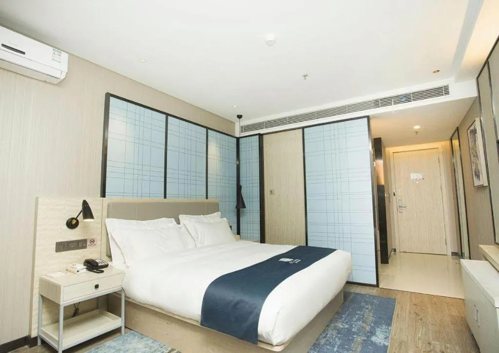 Bed in Echarm Hotel Changchun Jiutai District Government Railway Station