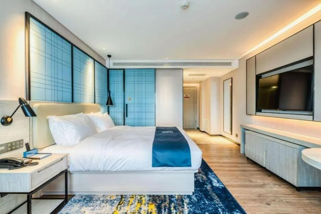 Bed in Echarm Hotel Changchun Jiutai District Government Railway Station