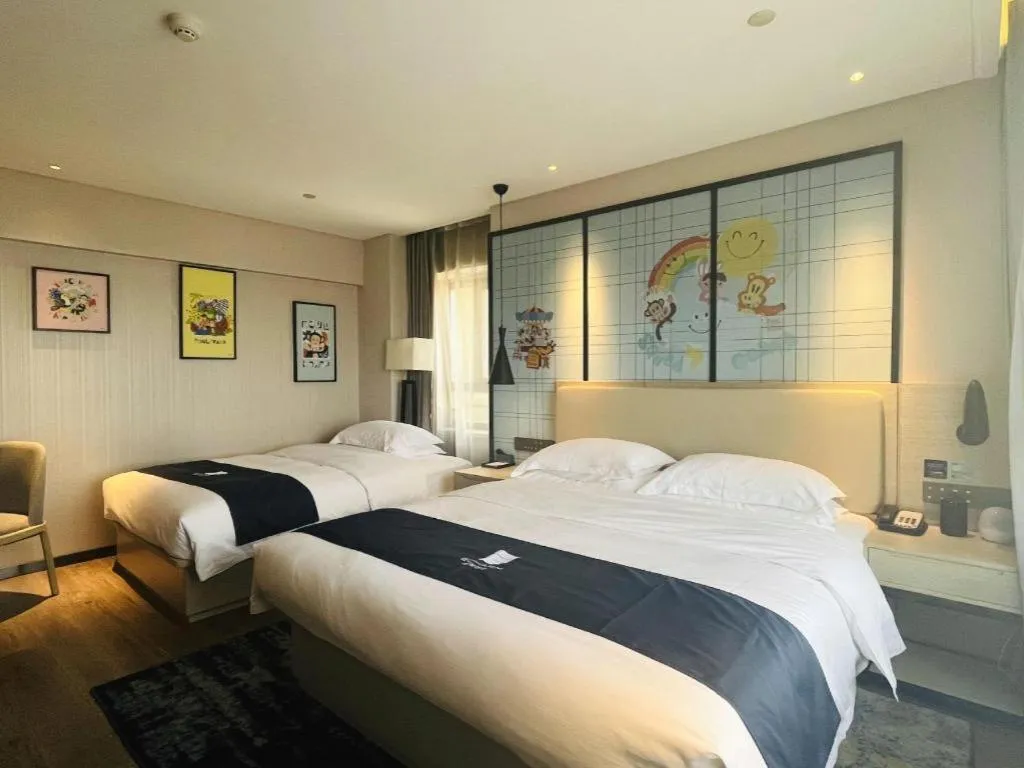 Bed in Echarm Hotel Changchun Jiutai District Government Railway Station