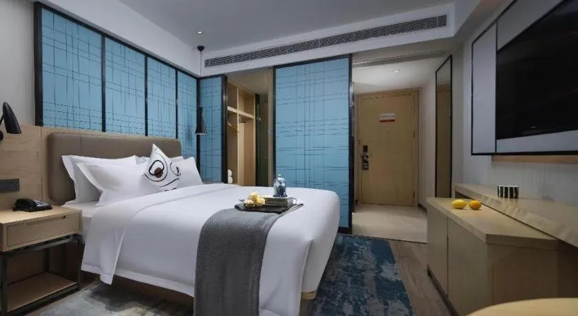 Bed in Echarm Hotel Changchun Jiutai District Government Railway Station