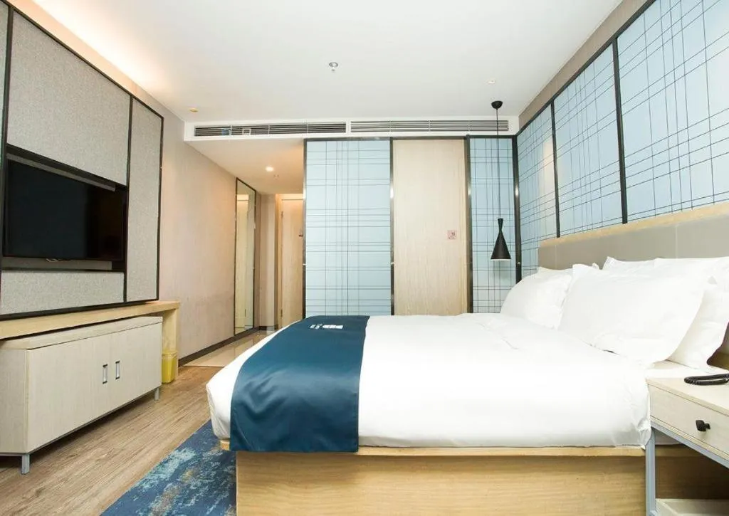 Bed in Echarm Hotel Changchun Jiutai District Government Railway Station