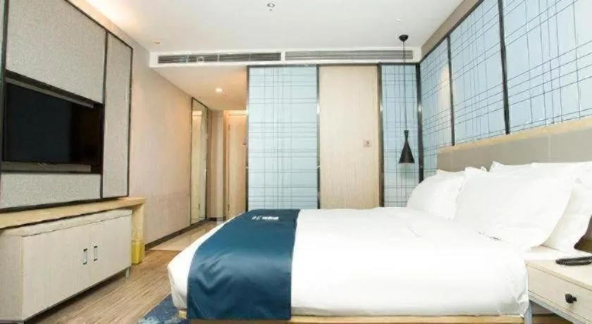 Bed in Echarm Hotel Changchun Jiutai District Government Railway Station