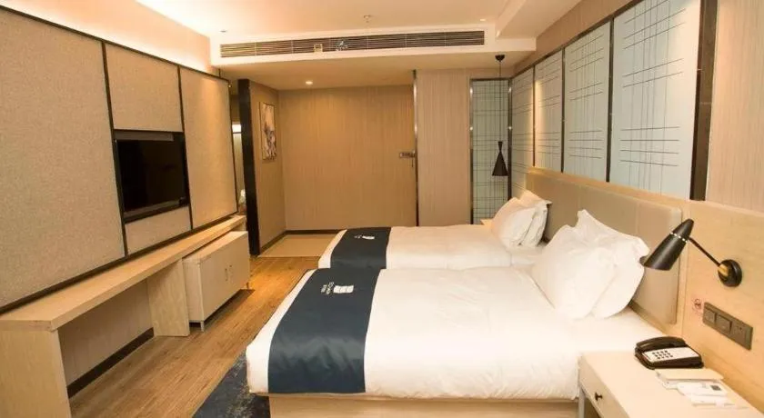 Bed in Echarm Hotel Changchun Jiutai District Government Railway Station