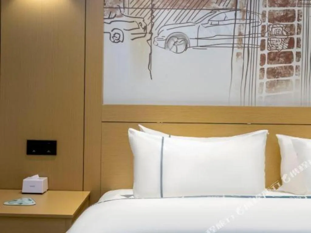 Bed in City Comfort Inn Yulin Youth Square 1st People's Hospital