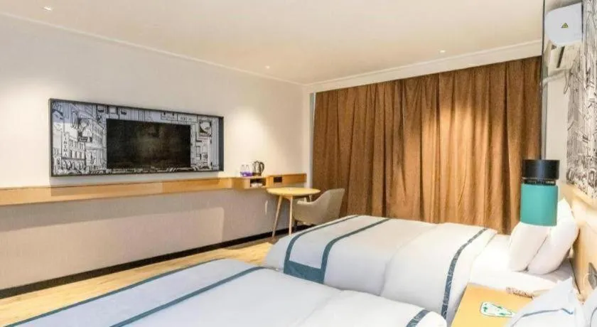 Bed in City Comfort Inn Yulin Youth Square 1st People's Hospital