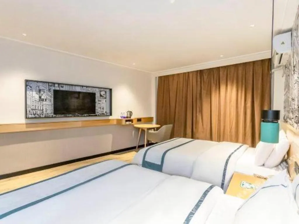 Bed in City Comfort Inn Yulin Youth Square 1st People's Hospital