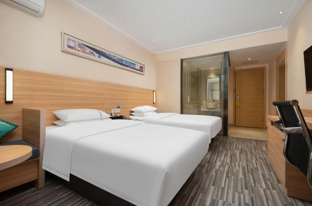 Bed in City Comfort Inn Wuhan Dream Times Baotong Temple Metro Station