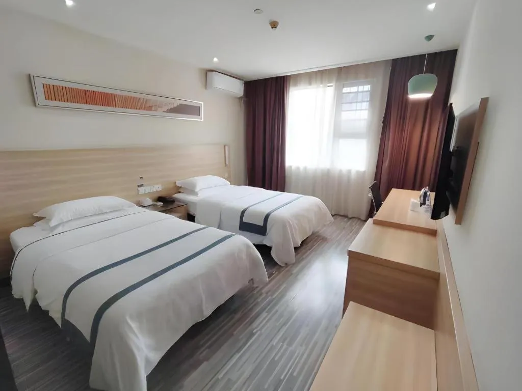Bed in City Comfort Inn Suizhou Lieshan Avenue