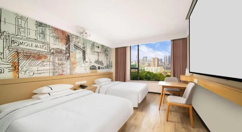 Bed in City Comfort Inn Huangshi Yangxin Mingyuewan Park