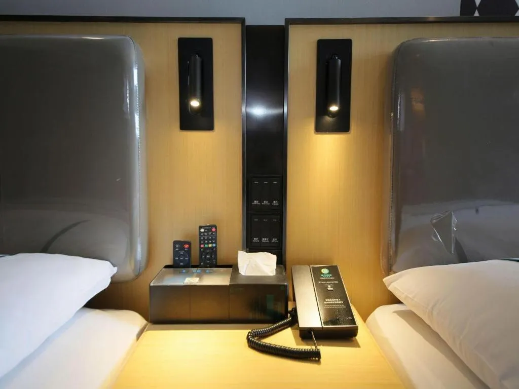 Bed in City Comfort Inn Huangshi Yangxin Mingyuewan Park