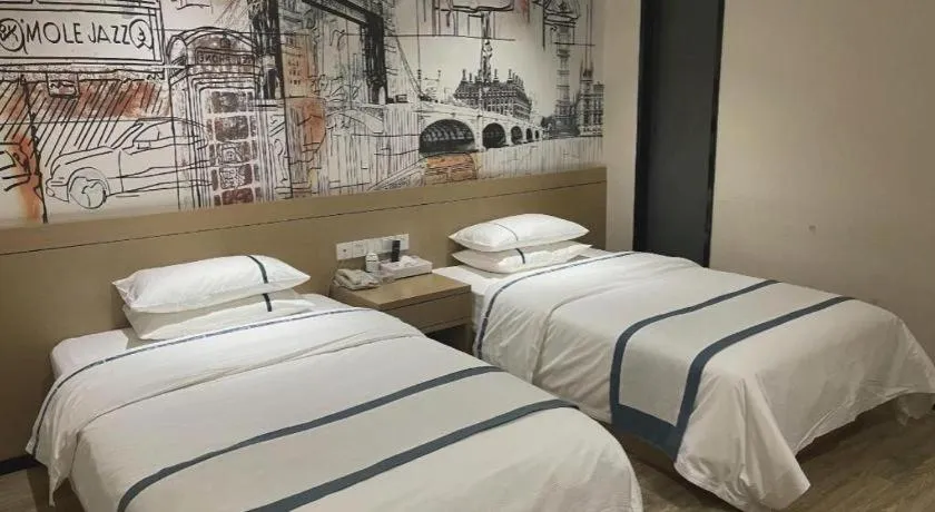 Bed in City Comfort Inn Huangshi Yangxin Mingyuewan Park