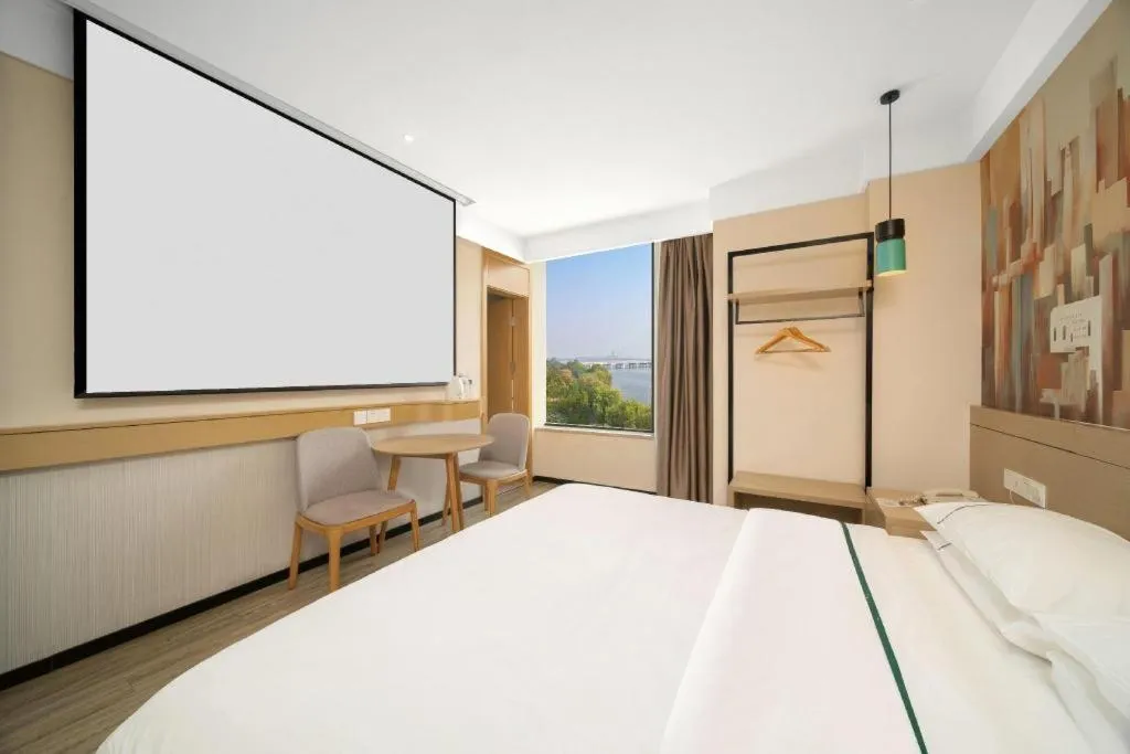 Bed in City Comfort Inn Huangshi Yangxin Mingyuewan Park