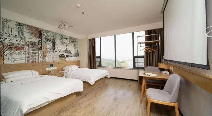 Bed in City Comfort Inn Huangshi Yangxin Mingyuewan Park