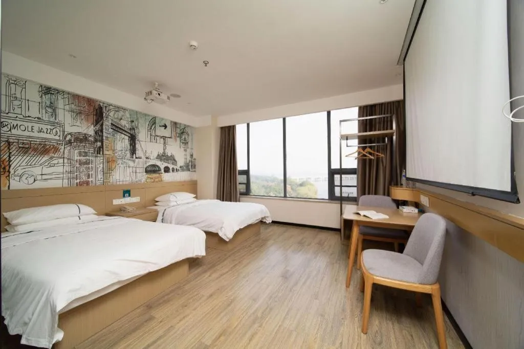 Bed in City Comfort Inn Huangshi Yangxin Mingyuewan Park