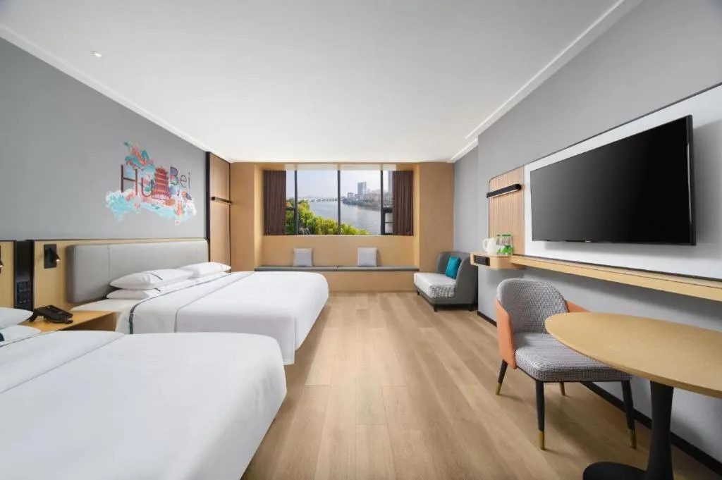 Bed in City Comfort Inn Huangshi Yangxin Mingyuewan Park