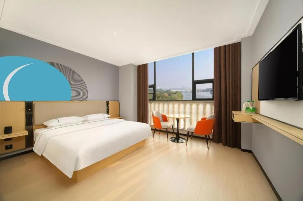 Bed in City Comfort Inn Huangshi Yangxin Mingyuewan Park