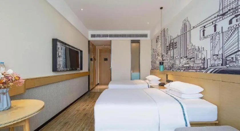 Bed in City Comfort Inn Zhaoqing Qixingyan Yihua Plaza Agile City