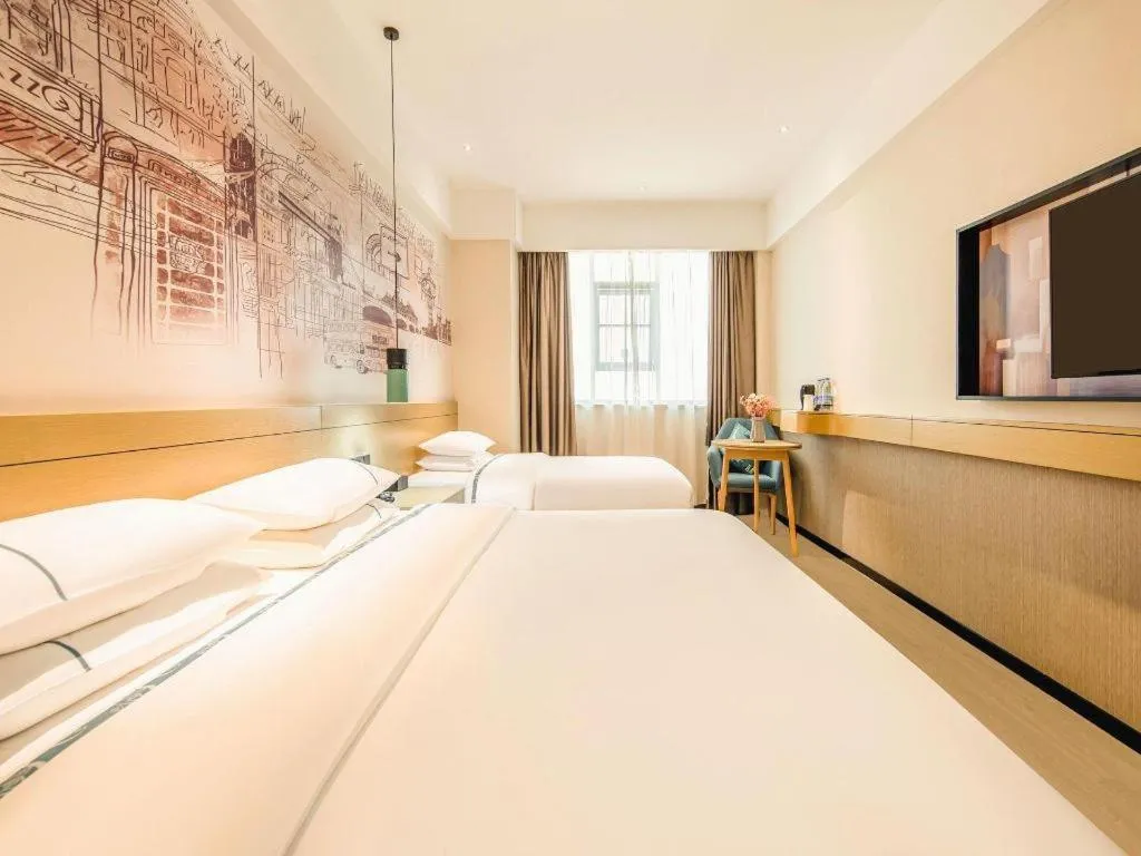 Bed in City Comfort Inn Zhaoqing Qixingyan Yihua Plaza Agile City