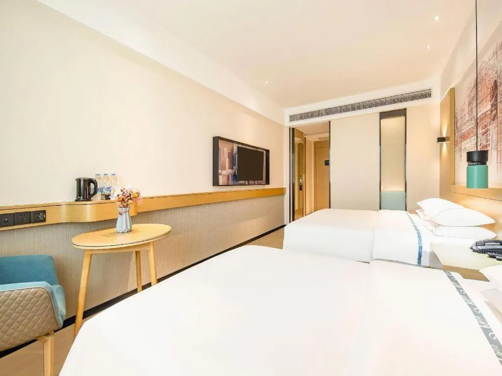 Bed in City Comfort Inn Zhaoqing Qixingyan Yihua Plaza Agile City