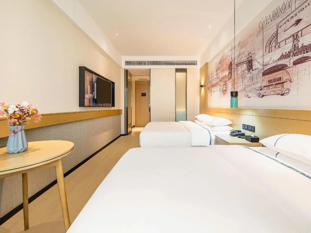 Bed in City Comfort Inn Zhaoqing Qixingyan Yihua Plaza Agile City