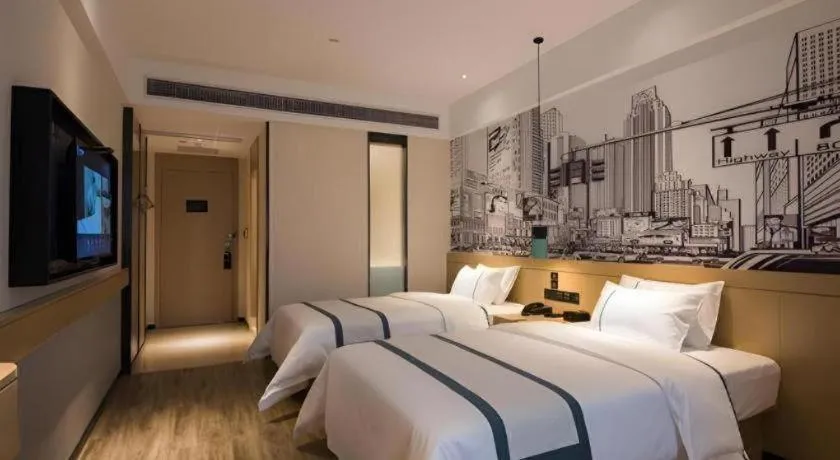 Bed in City Comfort Inn Zhaoqing Qixingyan Yihua Plaza Agile City