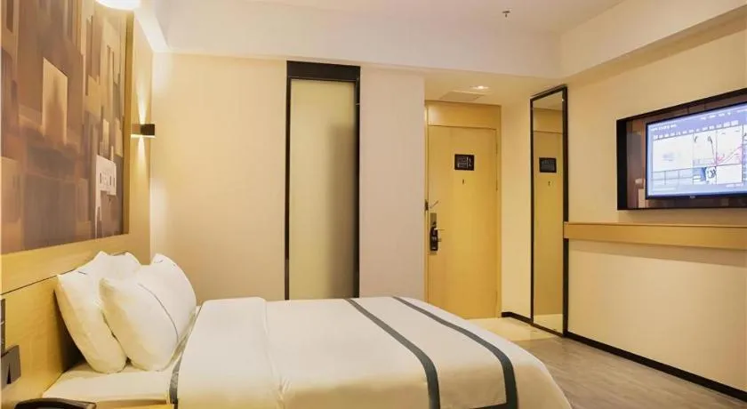 Bed in City Comfort Inn Maoming Xinyi Donghuicheng