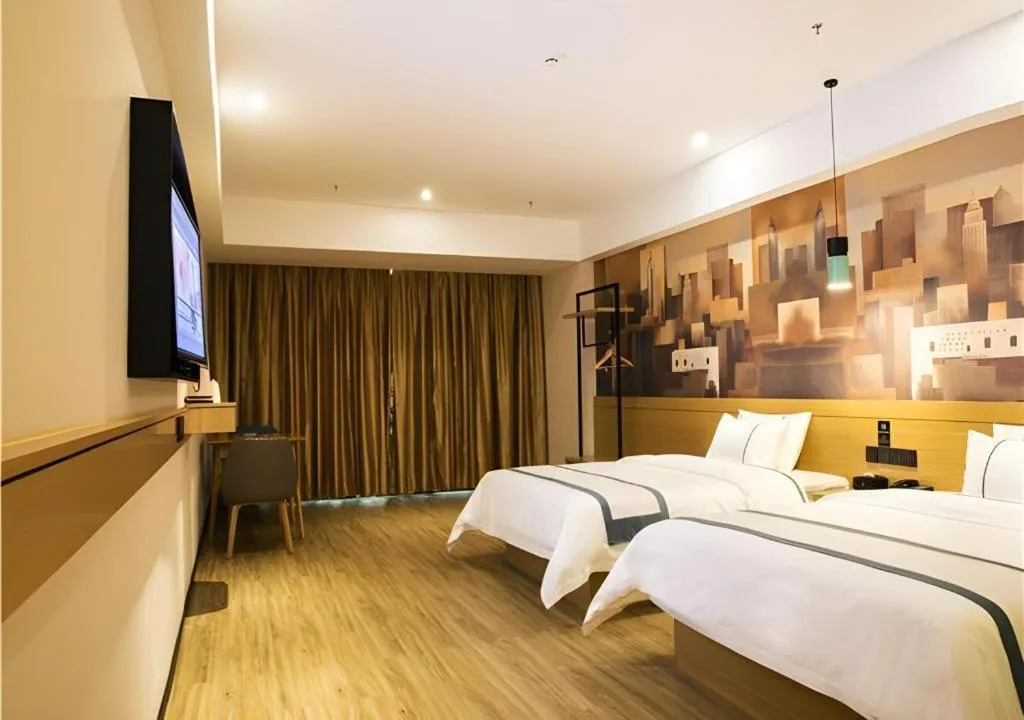 Bed in City Comfort Inn Maoming Xinyi Donghuicheng