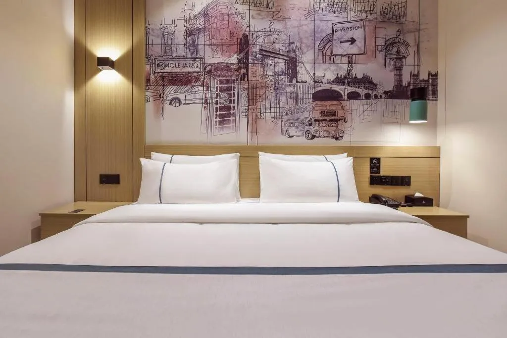 Bed in City Comfort Inn Dongguan Gaobu Avenue
