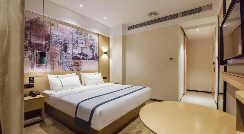 Bed in City Comfort Inn Dongguan Gaobu Avenue
