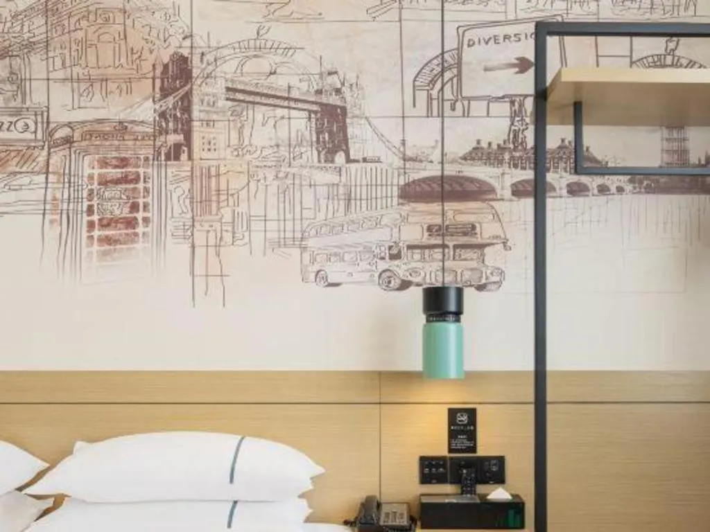 Bed in City Comfort Inn Dongguan Gaobu Avenue