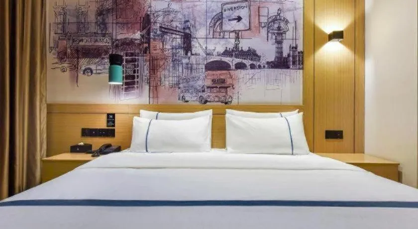 Bed in City Comfort Inn Dongguan Gaobu Avenue