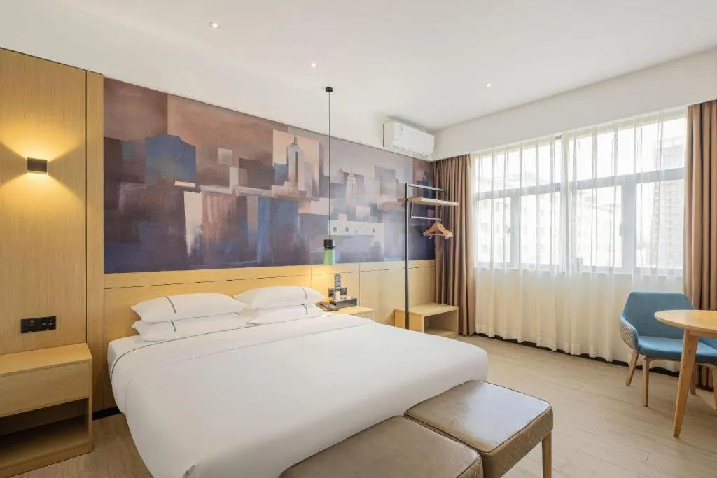 Bed in City Comfort Inn Dongguan Gaobu Avenue