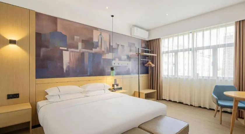 Bed in City Comfort Inn Dongguan Gaobu Avenue