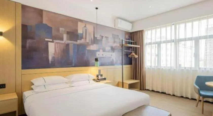Bed in City Comfort Inn Dongguan Gaobu Avenue
